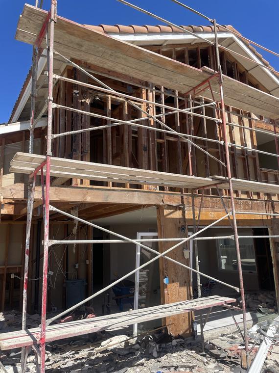 Two-story exterior strip-out